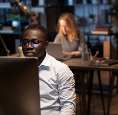 black-man-working-with-computer_23-2149370562